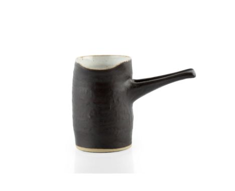 Lucie Rie (1902-1995) and Hans Coper (1920-1981)  Pouring vessel, circa 1960  manganese glaze with white interior impressed p
