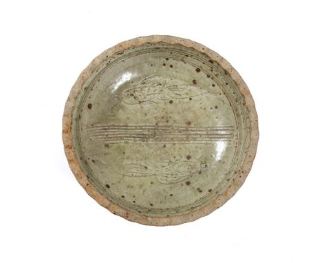 Jim Malone (b.1946) Bowl celadon glaze, incised fish decoration impressed potter's seal 25.5cm diameter.