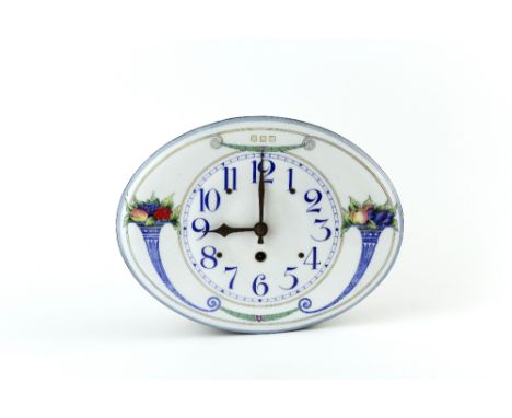 Secessionist School  Wall clock enamel face printed with cornucopia of fruit, in colours on a white ground 31cm across.