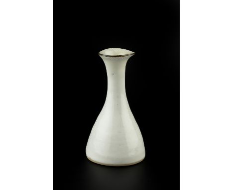 Lucie Rie (1902-1995) Pouring vessel oatmeal glaze impressed potter's seal 12.3cm high.