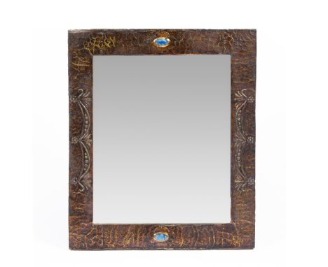 Arts &amp; Crafts Mirror, circa 1910 beaten copper with blue enamel cabochon detail 68cm x 56cm.