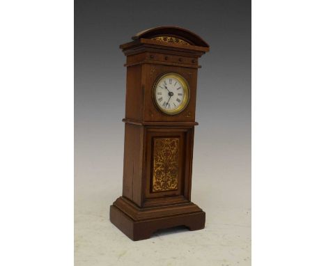 Early 20th Century miniature 'longcase' mantel clock, with Roman dial, timepiece movement, arch-topped walnut case with panel