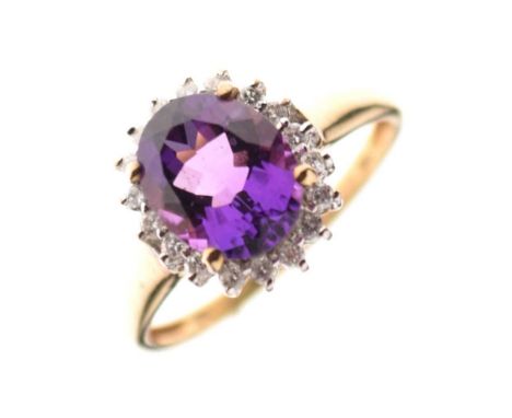 9ct gold cluster ring set oval cut amethyst and diamonds, size R½, 3.1g gross approx