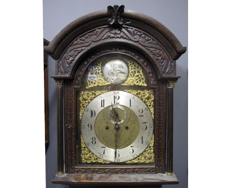 VICTORIAN OAK TWO TRAIN LONGCASE CLOCK the face marked W.S Shuker of Birmingham, having arched hood above arched aperture fla