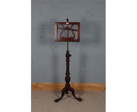 Victorian mahogany music stand, with a adjustable stand in the form of a harp and a turned and gadrooned column raised on cab