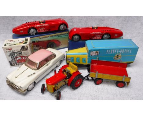 'SCHYLLING': TWO COLLECTOR'S SERIES TIN-PLATE 'SUNBEAM 1,000 LAND SPEED RECORD CARS (boxed) a tin-plate tractor with trailer 
