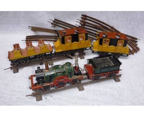 MARKLIN: A TIN-PLATE 'O' GAUGE MODEL RAILWAY SET including a 'Der Adler' locomotive and rolling stock, all in mid-19th centur