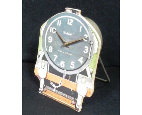 RAILWAY INTEREST: A MID-20TH CENTURY CHILD'S ALARM CLOCK by Enfield, with lithograph paper dial in the form of a locomotive f