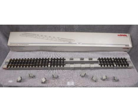 MARKLIN GAUGE 1: A ROLLER TEST STAND with six pairs of roller brackets, in original box, No. 59931