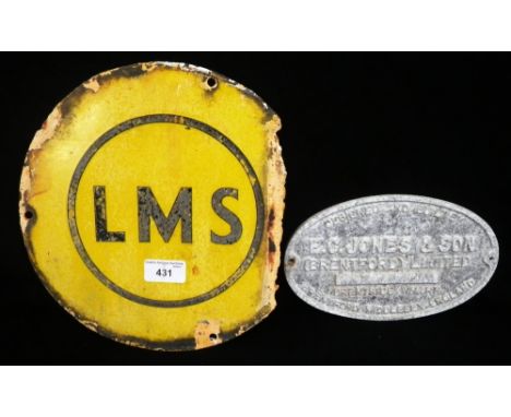 RAILWAY INTEREST: A YELLOW ENAMEL LMS CIRCULAR SIGN and a cast aluminium plate 'E C Jones & Son, Brentford Ltd'