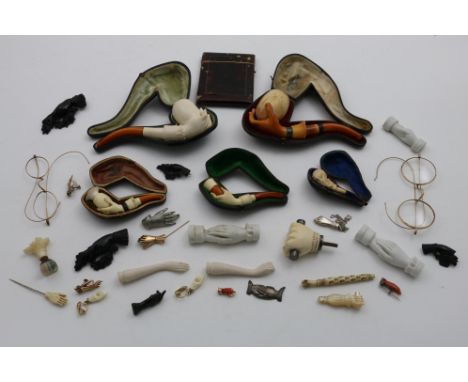 A MIXED LOT:- Five various Meerschaum pipes in fitted cases, a tortoiseshell card case and a quantity of small items, most pi