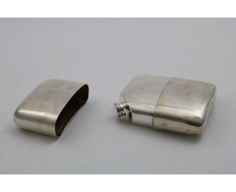 AN EARLY 20TH CENTURY SCOTTISH SPIRIT FLASK of rounded, rectangular form with a pull-off and angled closure, by Hamilton &amp