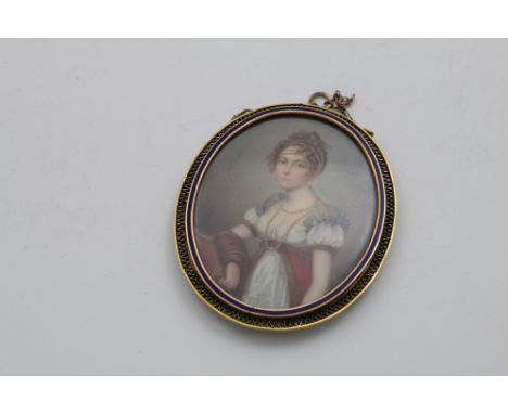 AN EARLY 19TH CENTURY PORTRAIT MINIATURE of a young lady wearing a blue-trimmed white dress and pearls, her hair in ringlets,