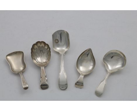 A GEORGE III CADDY SPOON with a shaped stem, initialled "H", by T. Robinson &amp; S. Harding, London 1810, another with a lea