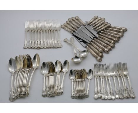 A VICTORIAN CANTEEN OF VICTORIAN PATTERN FLATWARE &amp; CUTLERY TO INCLUDE:- Eleven table spoons, eleven table forks, twelve 