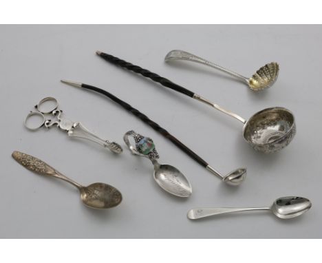 A LATE VICTORIAN SCOTTISH PROVINCIAL SMALL LADLE with a mounted whalebone handle, by Ferguson and MacBean of Inverness (F&amp
