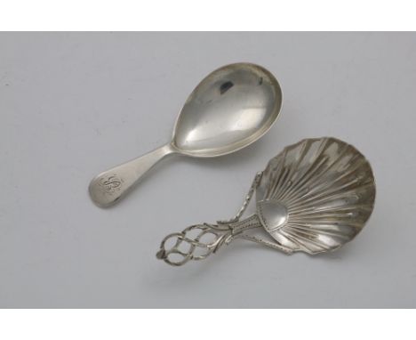A GEORGE III NORTH COUNTRY PROVINCIAL CADDY SPOON with a fluted shell bowl and a pierced, bright-cut stem, by J. Langlands &a