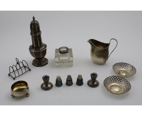A MIXED LOT:- A pair of bonbon dishes by A &amp; J. Zimmerman, Birmingham 1919, a sugar caster by Walker &amp; Hall, Sheffiel