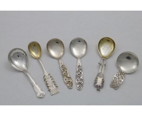 SCANDIVAVIAN CADDY SPOONS:- A Finnish example with enamel and drop rings, the gilt bowl initialled, Turku 1951, another with 