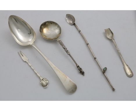 FIVE ITEMS OF FLATWARE:- A handmade cocktail fork with a cast "cherry" terminal, by Amy Sandheim, London 1925, a George III t