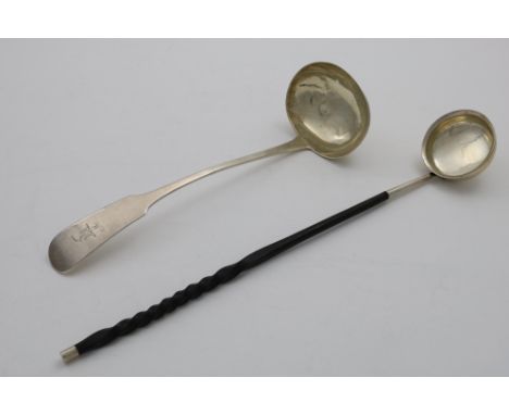 A GEORGE IV SCOTTISH OAR PATTERN SOUP LADLE crested and initialled "M", maker's mark "W.E", Edinburgh 1826 and a Scottish pun