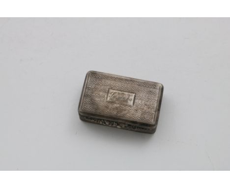 A WILLIAM IV SMALL RECTANGULAR SNUFF BOX with engine-turned decoration, reeded sides and a raised floral thumbpiece, the cart
