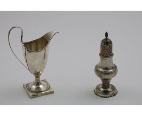 A GEORGE III BALUSTER PEPPER CASTER on a circular pedestal foot with bead borders, a domed cover and a wrythen finial, by Sam