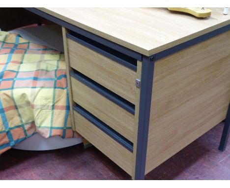 Pair of light wood office desks and a small three drawer cabinet
