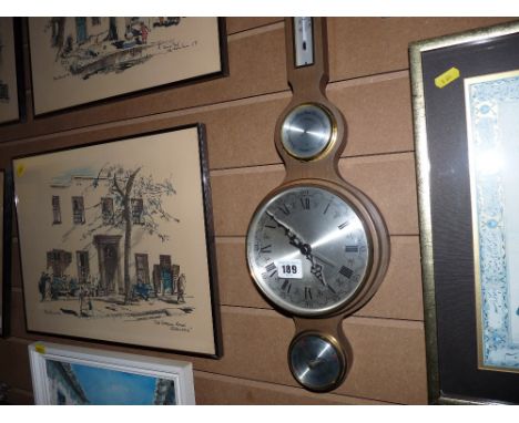 Modern balloon barometer labelled Ames, South Africa