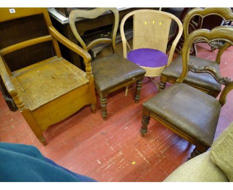 Wooden armchair commode, three rexine seated antique style chairs and a single loom and basket weave chair