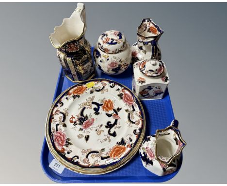 A collection of Masons china including double landscape pattern jug, a pair of Mandalay jugs, plates, caddy etc.