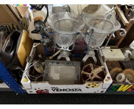 A box of tin wall signs, pair of glass table stands, barbola type table lamp, photo frames etc 