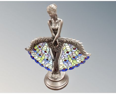 A Tiffany style table lamp modelled as a lady with fans.