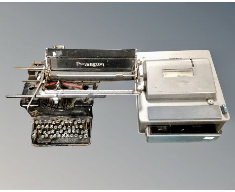 A vintage Remington typewriter together with a vintage Gross cash register.