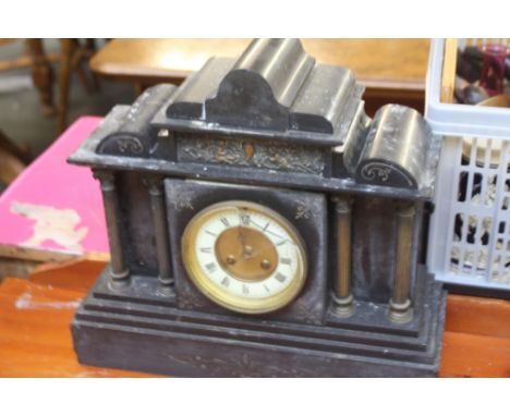 A 19thC slate mantle clock, in the form of a temple with Roman numerals, 41cm wide
