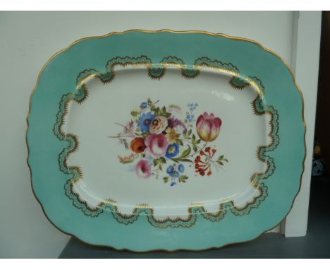 A Staffordshire Coalport type meat platter or central floral design with light turquoise border heightened in gilt over a cre