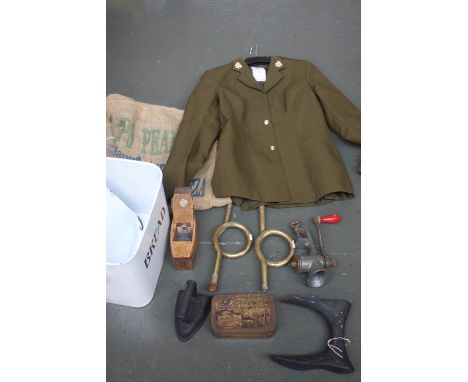 A selection of metal items to include a flat iron, a shoe slob, an enamel biscuit tin and a hemp bag together with a uniform 