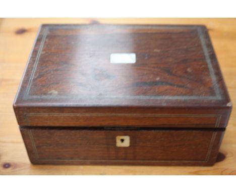 A Victorian ladies rosewood sewing box, with mother of pearl inlay