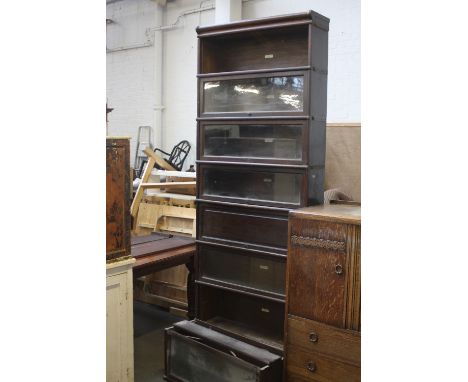 A set of oak 9 shelf Globe-Wernicke Co ltd glass-fronted stacking shelves, 86cm wide