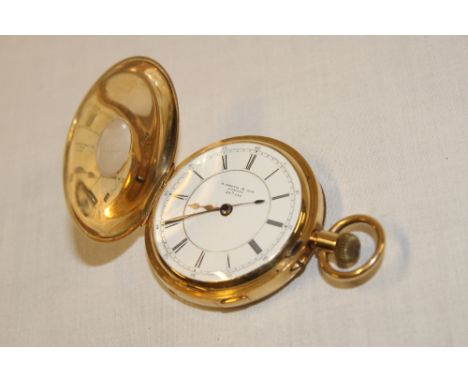 A gentleman's 18ct gold half hunter pocket watch by S Smith & Sons "Strand Watch" with circular enamelled dial in 18ct gold p