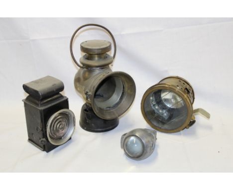 An old brass Lucas King of the Road No.722 motoring lamp (af) and three other various motoring-style lamps (4)