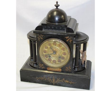 An old mantle clock with gilt circular dial in black slate pavilion-style case 