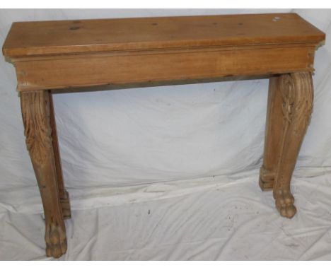 A polished pine rectangular console table with plain frieze on scroll shaped legs and paw feet, 32" high x 42" wide 