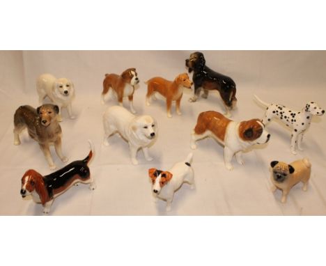 A collection of various china dogs including a Beswick Jack Russell, Beswick Bassett Hound, various Sylvac dogs and others et