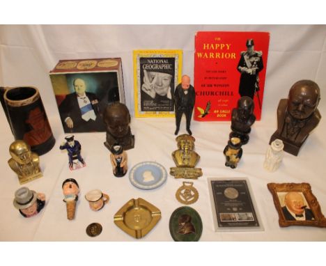 A selection of Winston Churchill memorabilia including cast iron Winston Churchill bust, bronze bust figure, similar brass bu