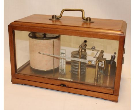 A good quality brass mounted barograph by Charles J Gaupp & Co Hong Kong in mahogany glazed traditional case 