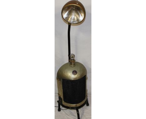 An unusual motoring related floor-standing reading lamp, the base adapted from a Morris Cowley vintage car radiator with calo