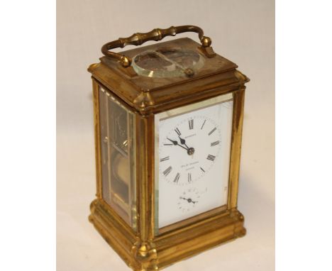 A good quality chiming carriage clock by Bennett of London with rectangular enamelled dial in brass traditional case (af) 