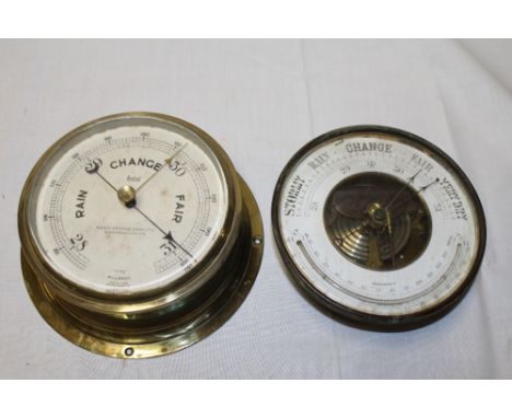 A marine-style circular Sestrel barometer by Henry Browne & Son Ltd in brass cylindrical case and one other aneroid circular 