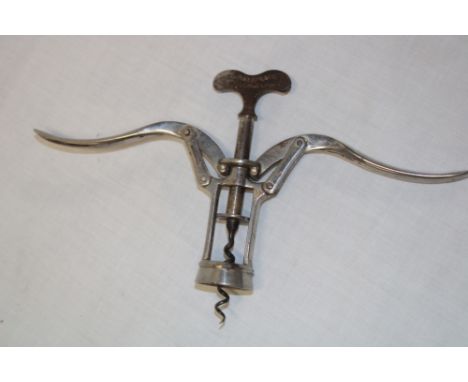 A James Heeley and Co "double lever" nickel plated corkscrew